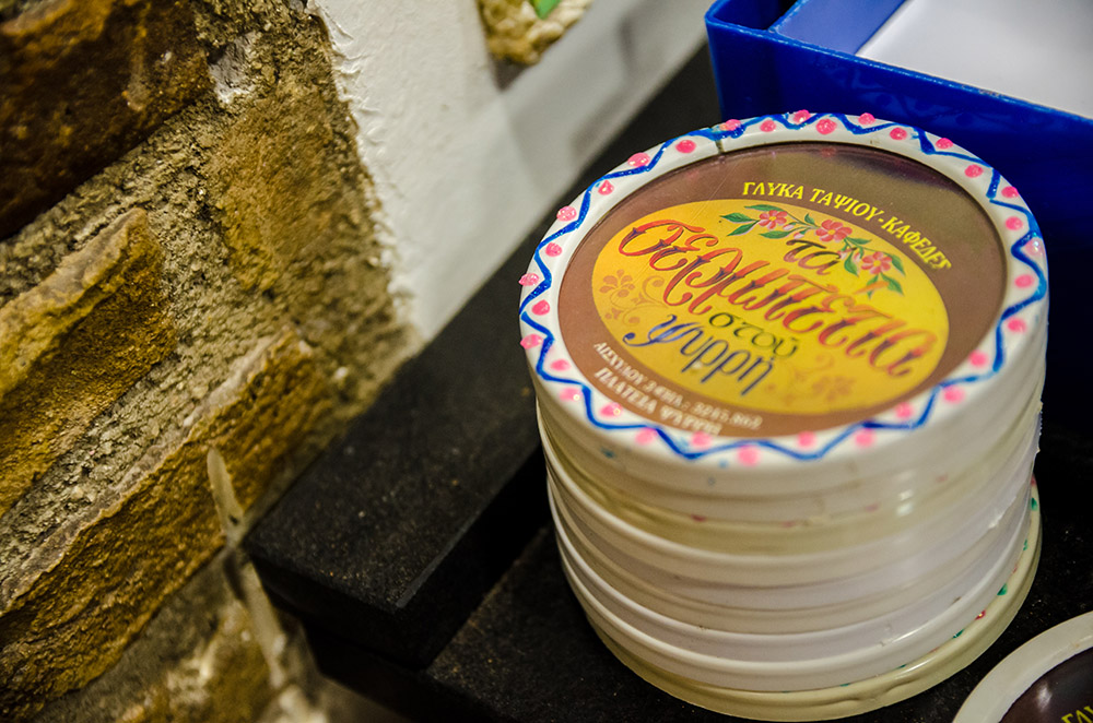 Stacked lids with the hand-drawn house label