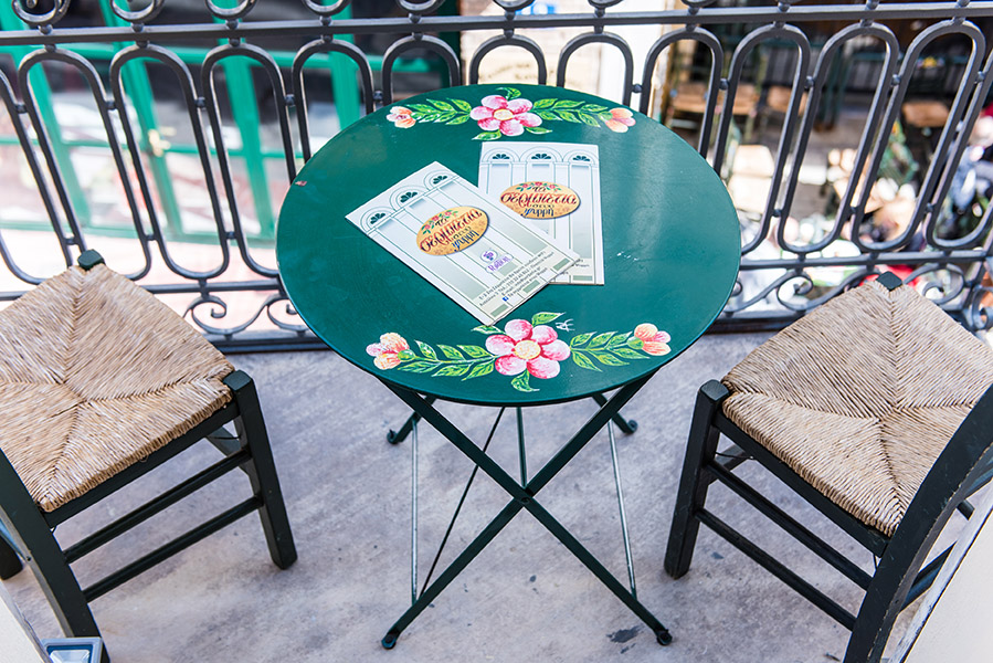 A hand-painted table set for two