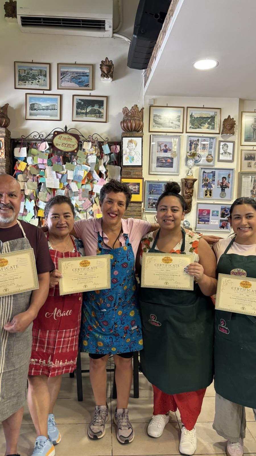 The group celebrates with their workshop certificates